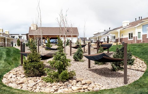 Comfortable hammock bar in a beatiful outdoor space surrounded by trees and mountain air at Klein Huis in Heber Utah