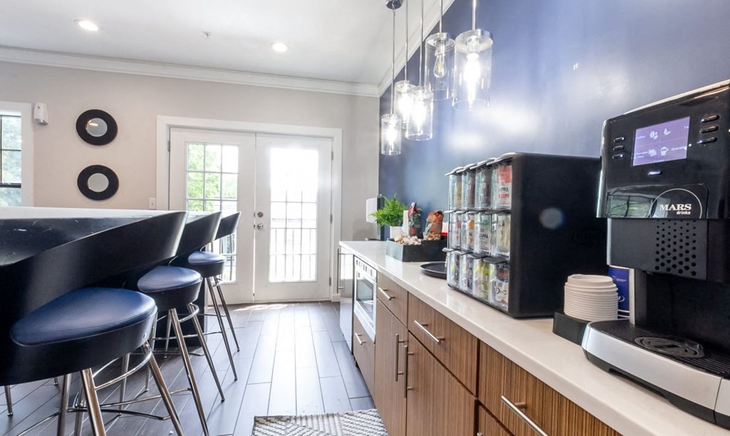 a kitchen with a counter top and a coffee machine