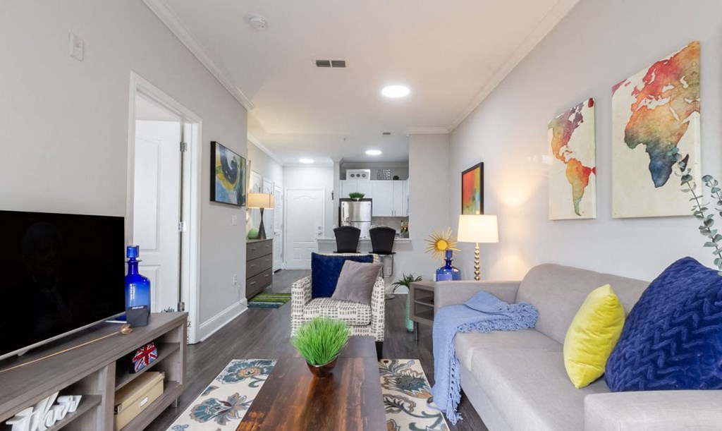 a living room with a couch and a tv