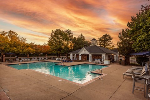 the pool at sunset at the resort at governors crossing
