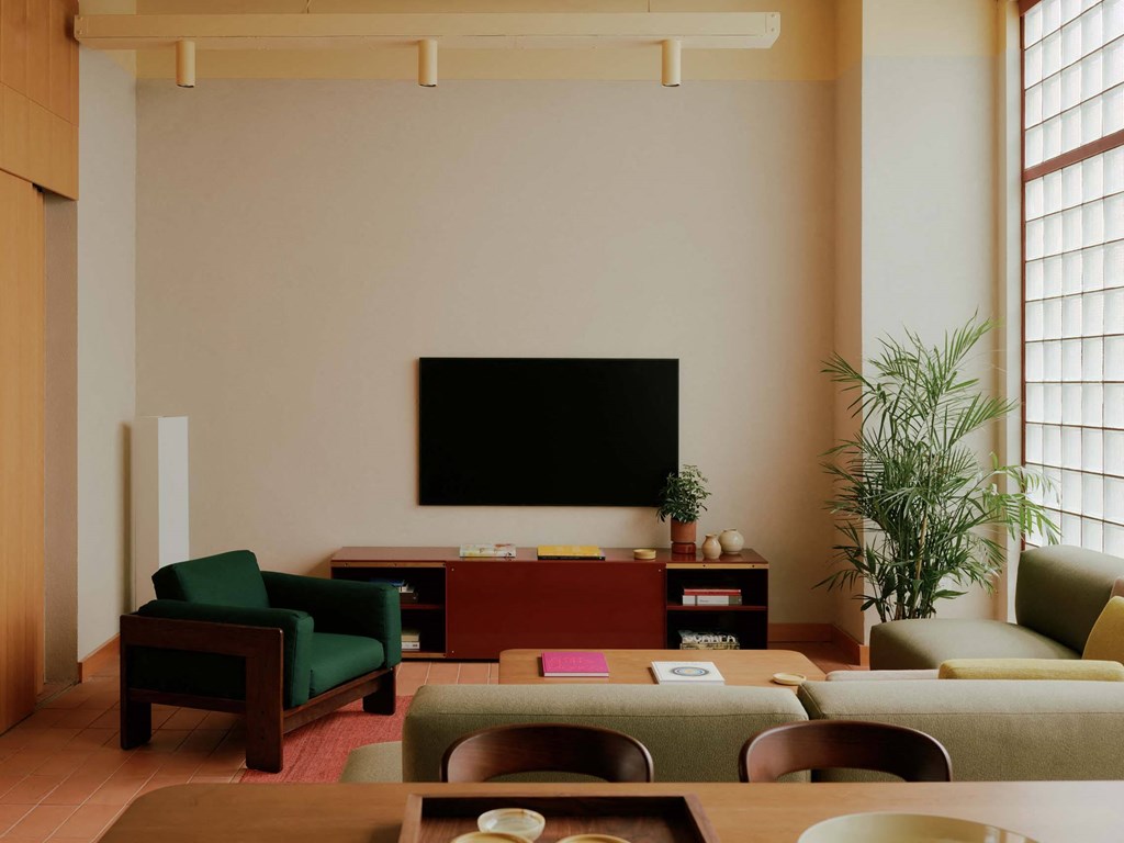 a living room with a couch and a television