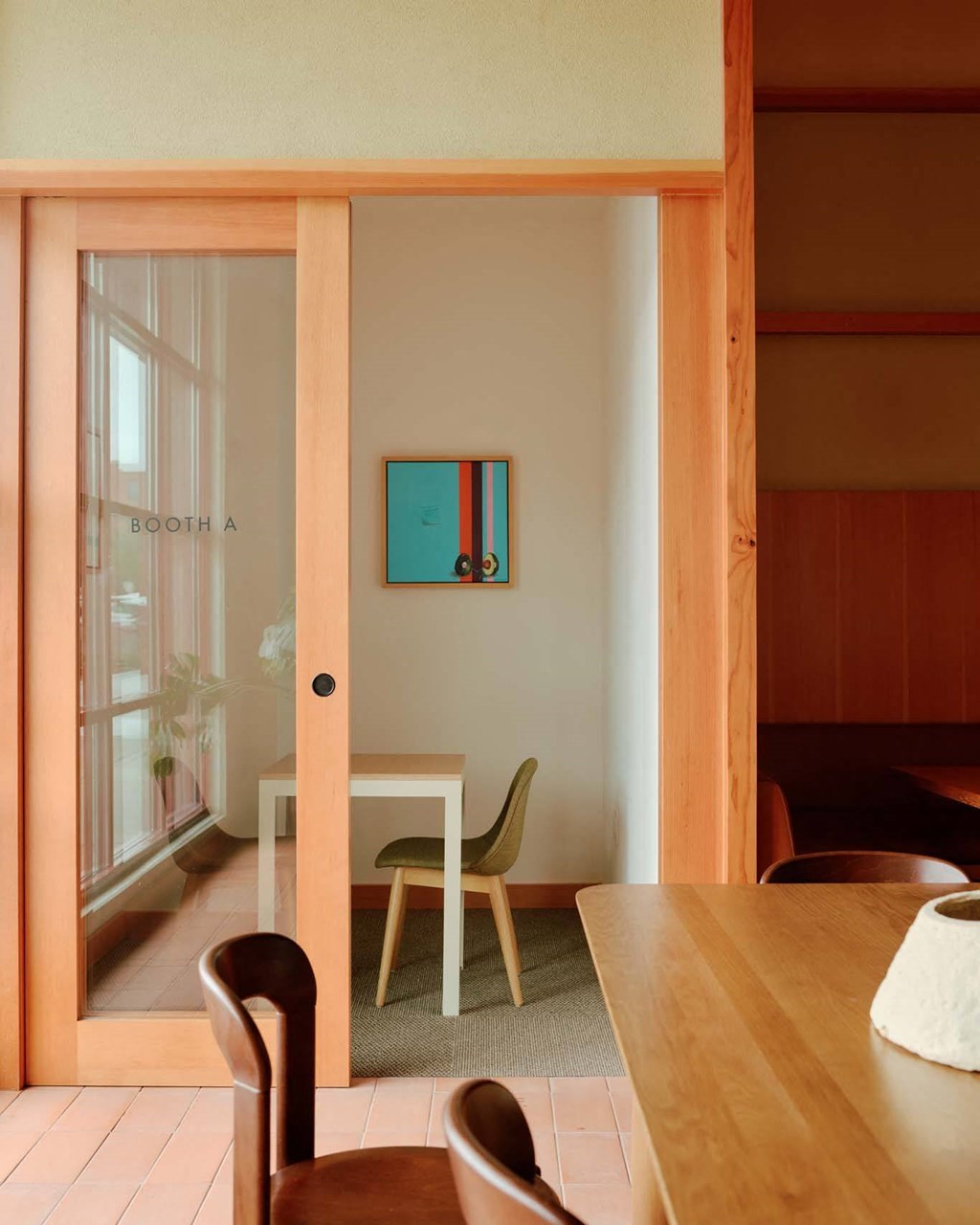 a rendering of a dining room with a table and chairs