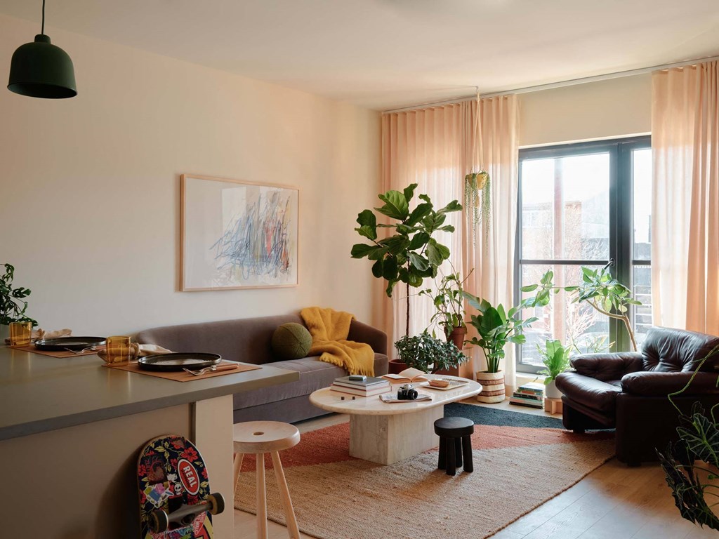 a living room with a couch and a table