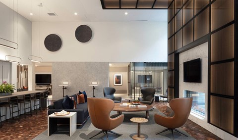 a lobby with a living room and a kitchen