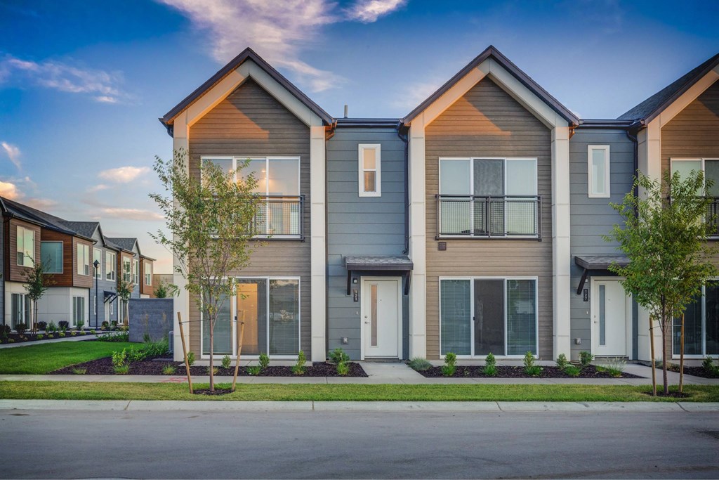 the facade of a building with different colored lights on it