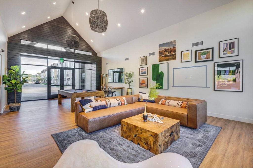 a living room with couches and a table