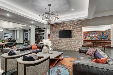 a living room with couches and a television