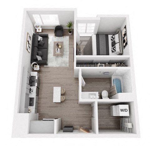 A top-down view of a modern living room with a couch, coffee table, and a plant.