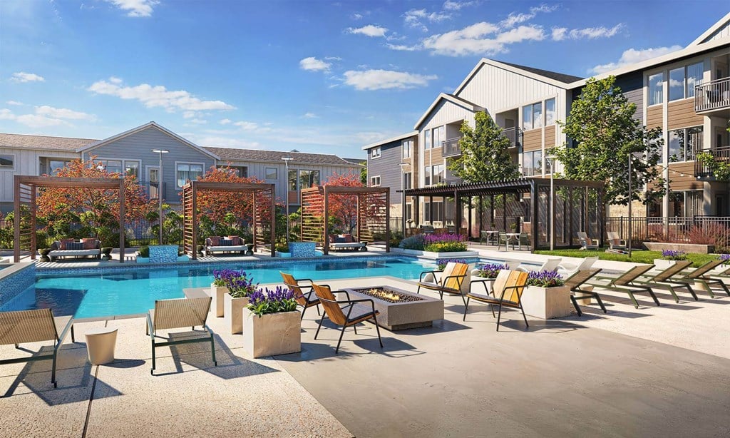 Swimming pool with cabanas at Firestone Junction apartments in Firestone, CO