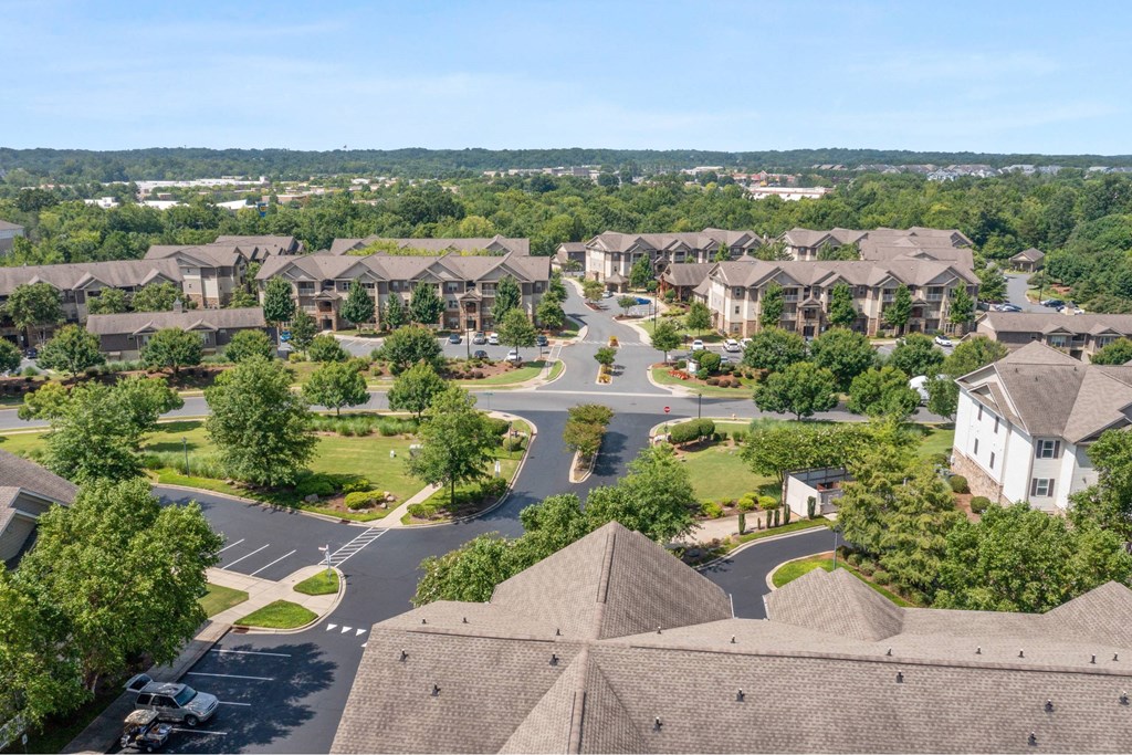 A residential area with houses and a road.