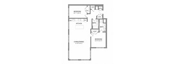 A floor plan of a small apartment with a living/dining area, kitchen, and two bedrooms.