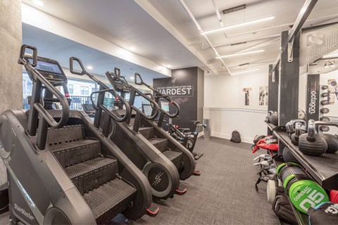 A gym with treadmills and exercise equipment.