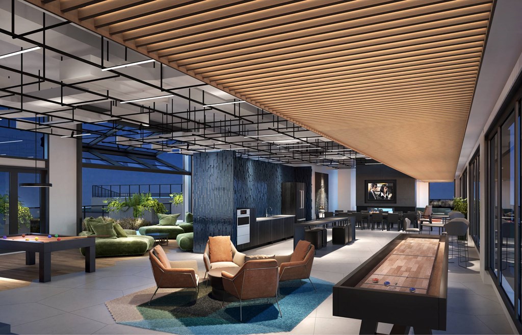 A modern living room with a pool table and comfortable seating.