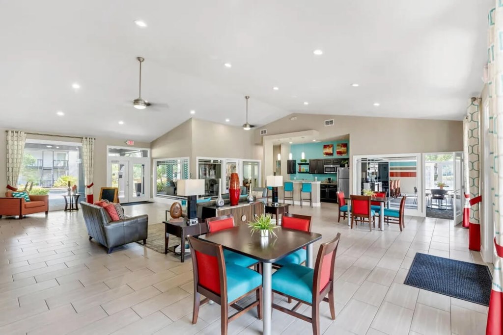 A spacious dining area with a table set for six.