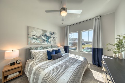 Large bedroom with ceiling fan at Mason Augusta brand new apartments.