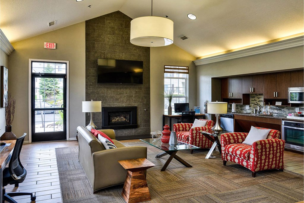 A living room with a fireplace and a couch.