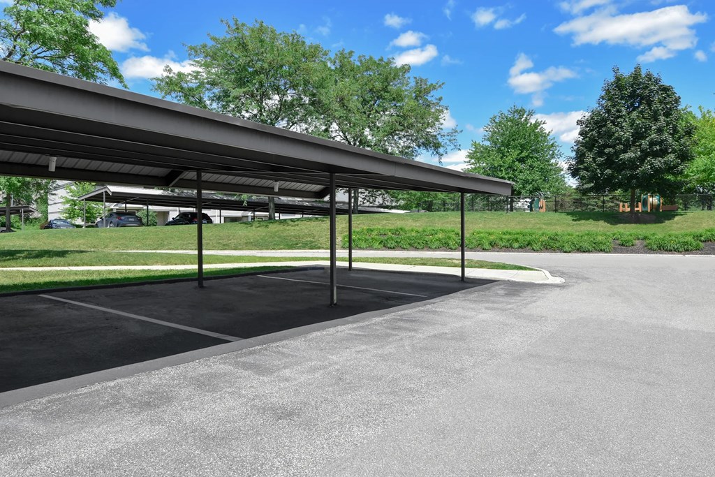 A parking lot with a large canopy over it.