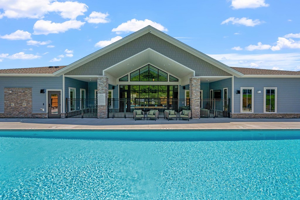 Clubhouse and pool view at The Lodge at Overland townhome rentals in Rochester, MN.