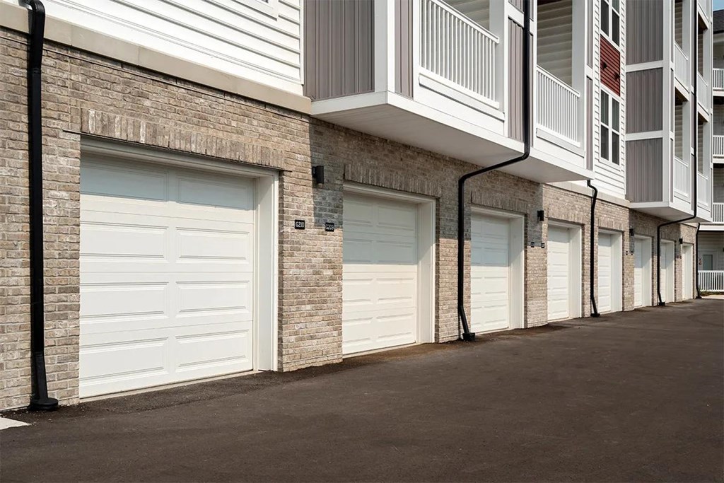 A row of garage doors are closed.