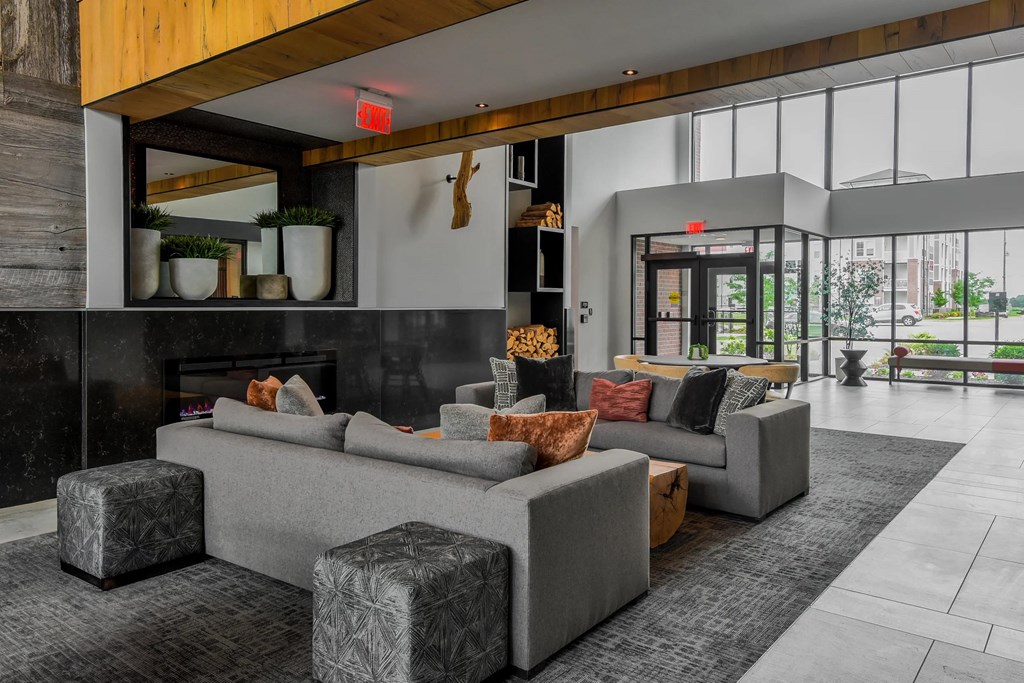 Clubhouse with sofas at The View on Collins apartments for rent in Lansing, MI