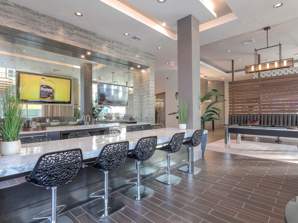 A bar area with a TV at The Adeline, Glendale, 91203
