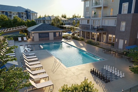 A pool with chess pieces on the ground.