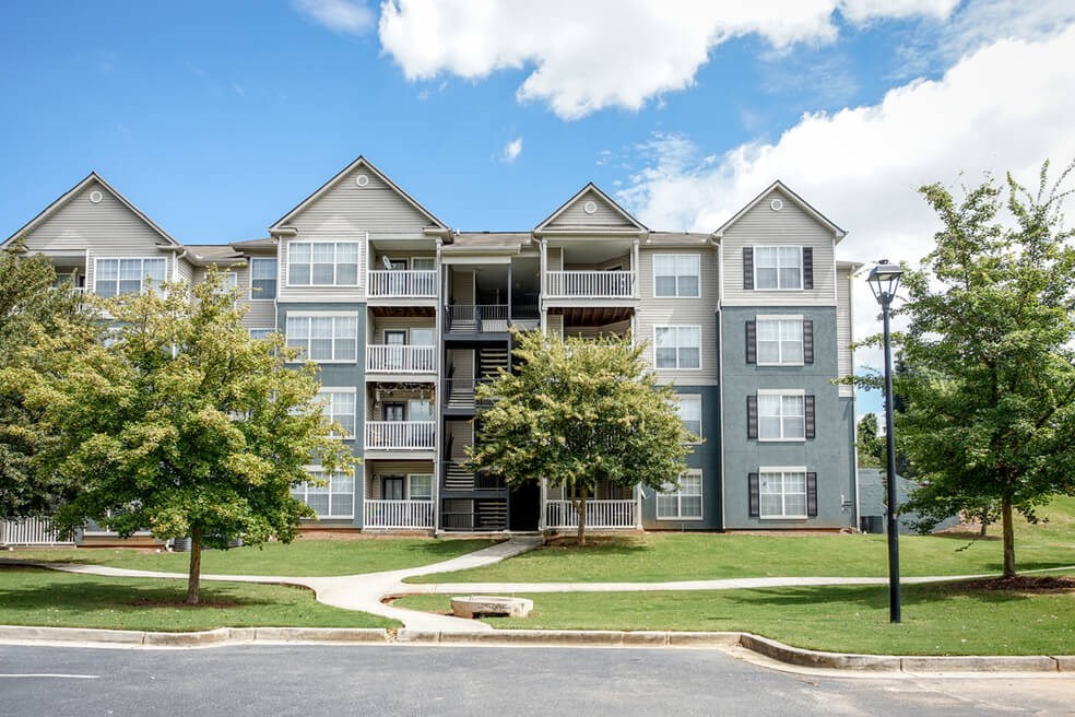 Exterior street view of Monterey Village apartments for rent in Jonesboro, Georgia.
