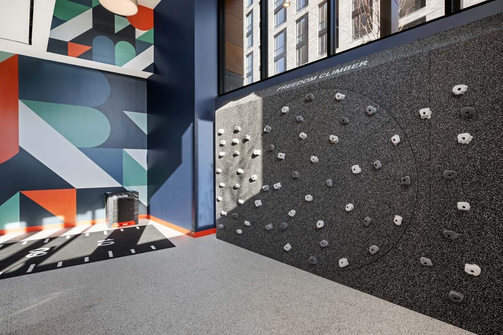 A wall with a pattern of holes in it.