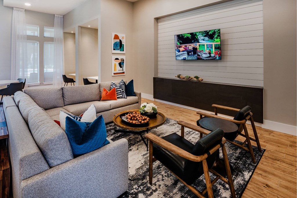 Resident lounge with entertainment space and ample seating at Brandywine Green, Maryland, 20613