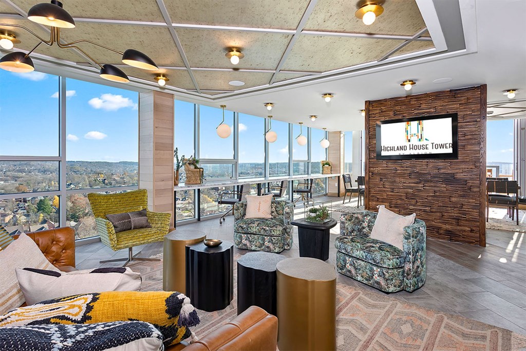 A large room with a sign that says Highland House Tower.