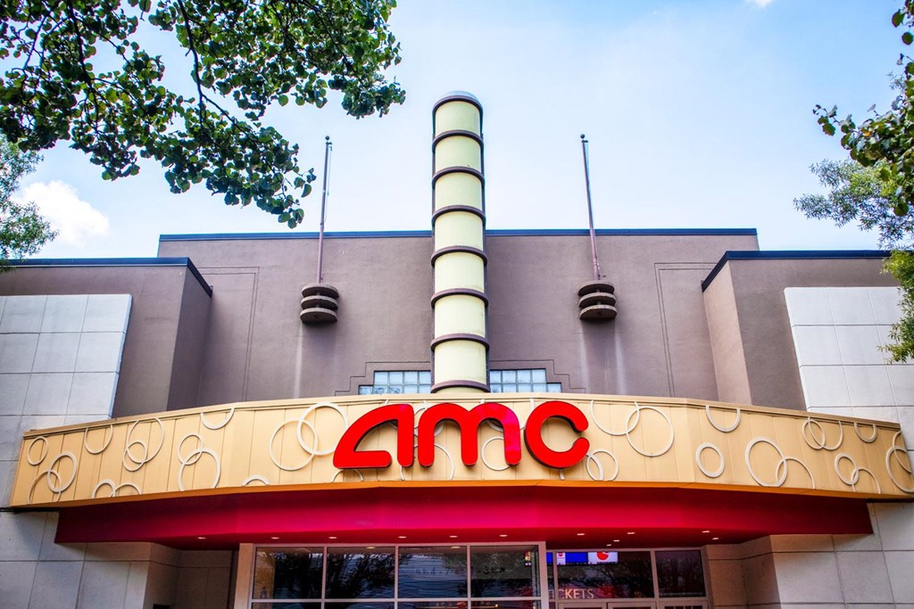 A movie theater with the name AMC on the front.