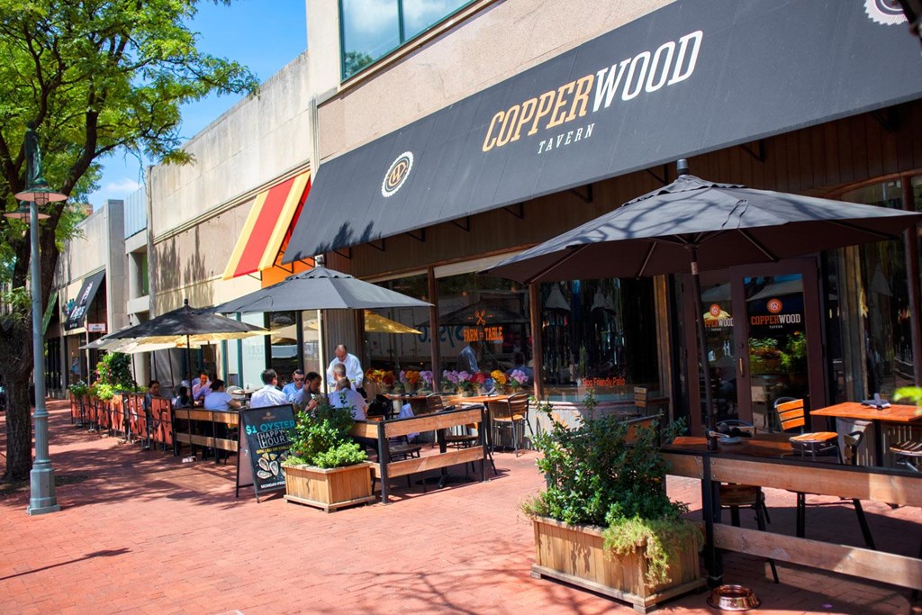 A Copperwood Tavern sign is on a building.