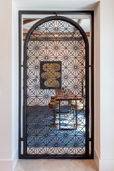 A black iron gate at Corban Freedom Apartments, Orlando