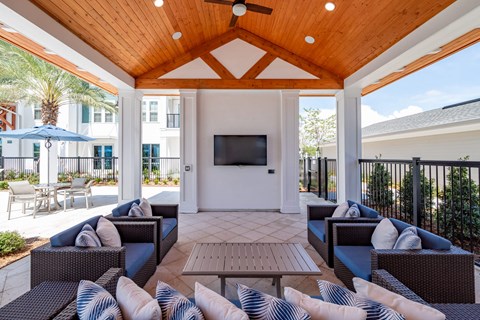 Outdoor Patio With TV at Corban Freedom Apartments, Orlando, 32837