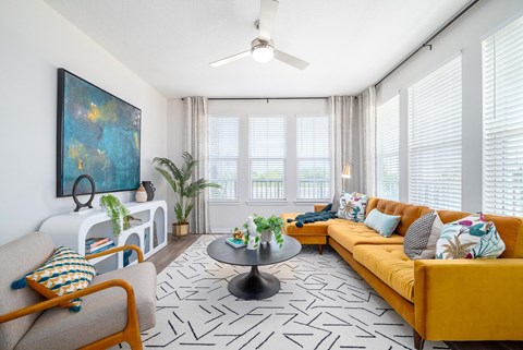 Living Room With TV at Corban Freedom Apartments, Orlando Florida