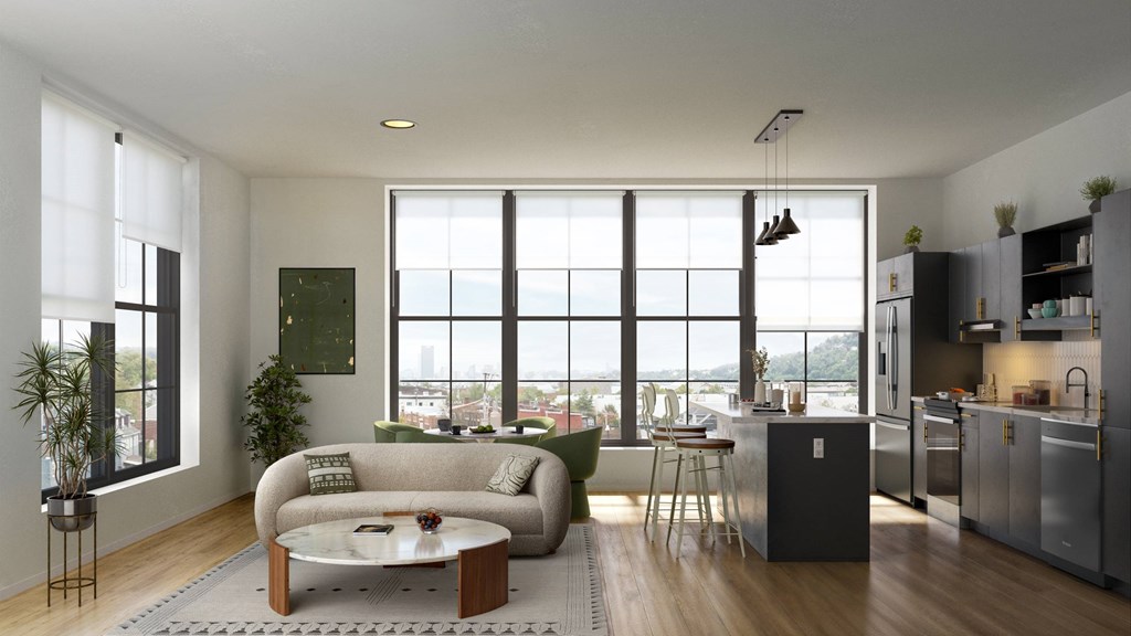 A modern living room with a large window and a view of the city.
