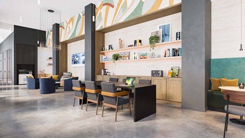 A modern living room with a grey sofa and a wooden coffee table.