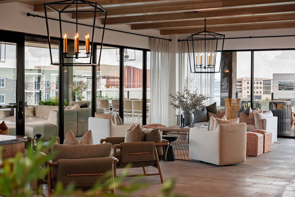 A modern living room with a view of the city.