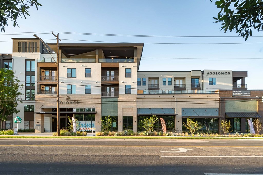 A modern building with the name "BSOLOMON" on the top right corner.