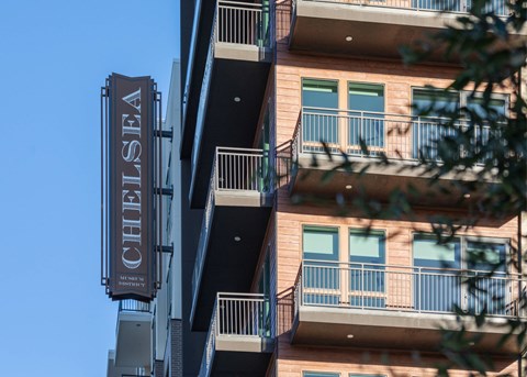 A building with a sign that says Chelsea.