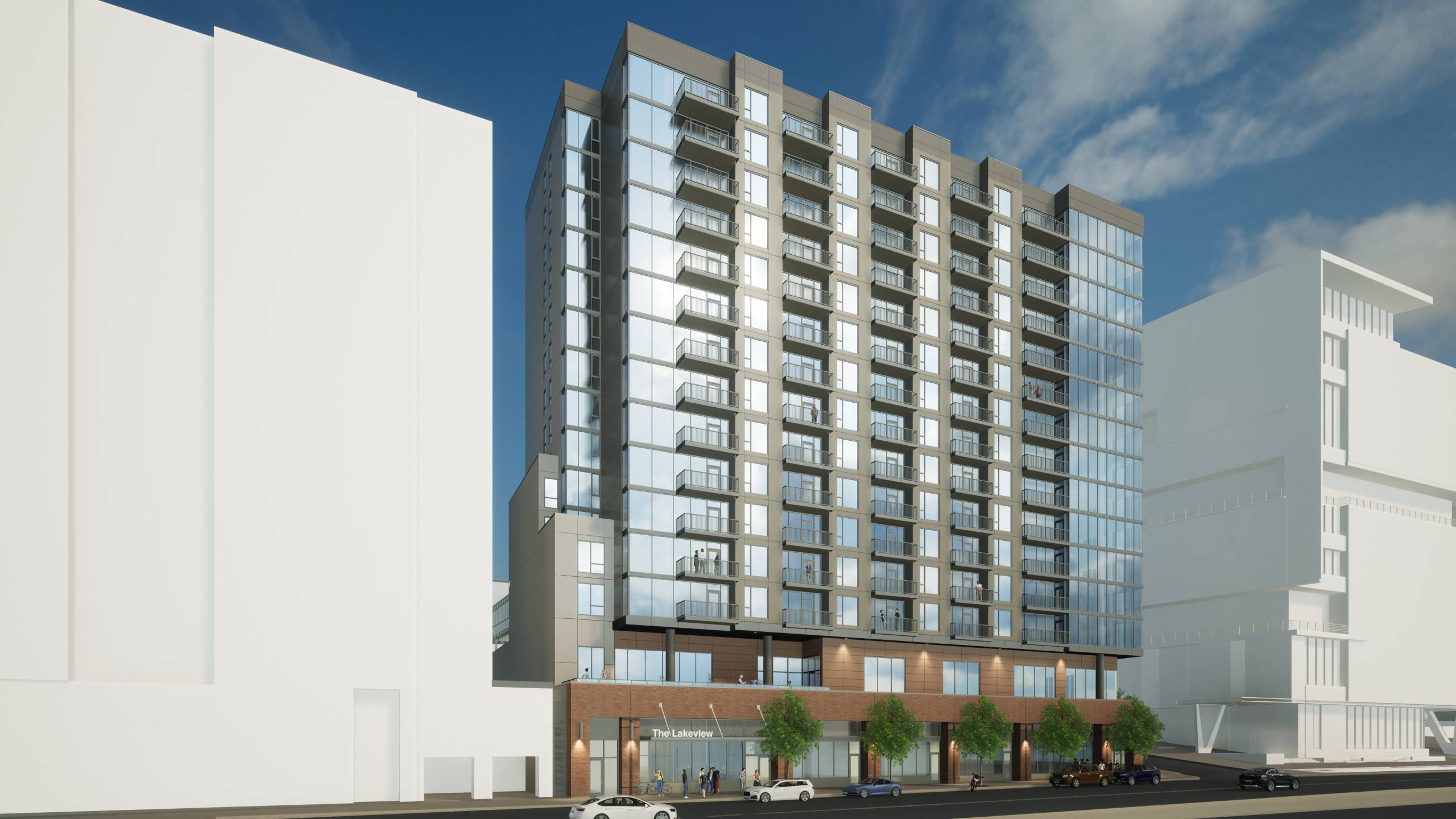 A modern building with a glass facade is depicted in the image.