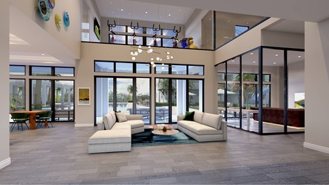 A modern living room with a large sectional sofa and a coffee table.