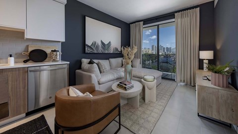 A modern living room with a brown leather chair and a large window overlooking the city.