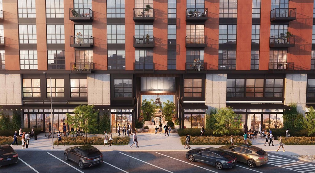 A large building with a lot of windows and balconies is shown in the image.