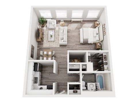 A top-down view of a small, neatly organized apartment with a kitchen, living room, and bedroom.