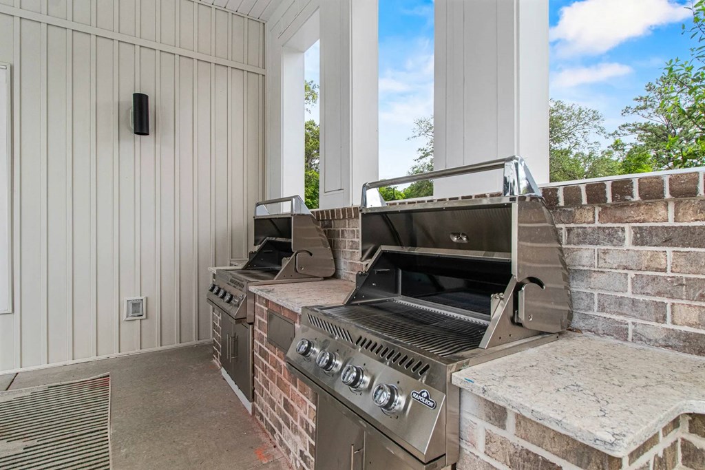 Outdoor lounge with grills