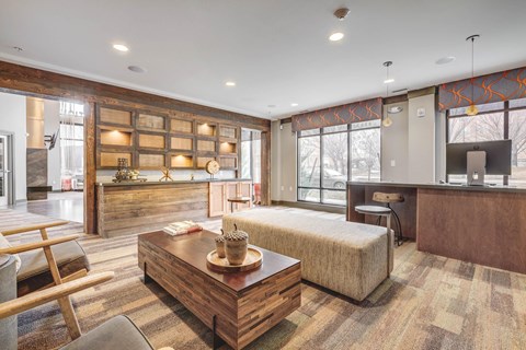 A living room with a wooden coffee table and a couch.