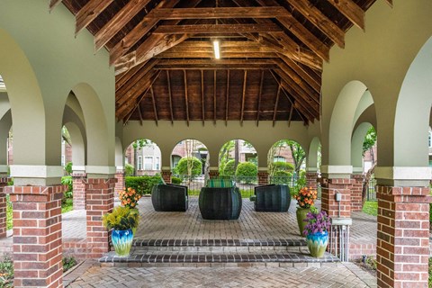 A building with a wooden roof and arches.