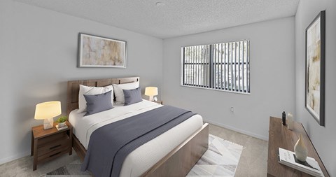 A bedroom with a bed, nightstands, and a window with blinds.