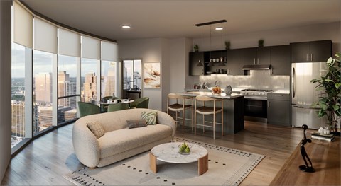 A modern kitchen with a view of the cityscape outside the window.